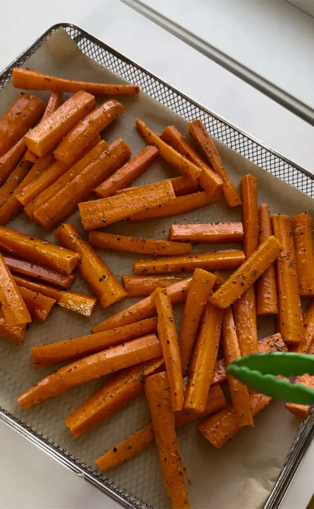 Spread carrots on air fryer roasting pan
