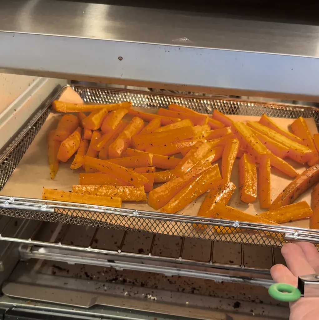 Roast carrots in air fryer oven at 375F for 20-25 minutes.