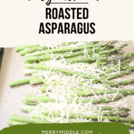 Asparagus spread on baking tray lined with parchment.