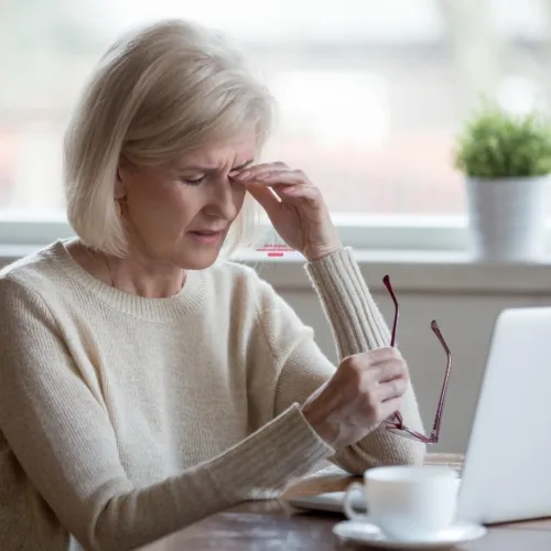 Woman confused and upset experiencing menopause brain fog.