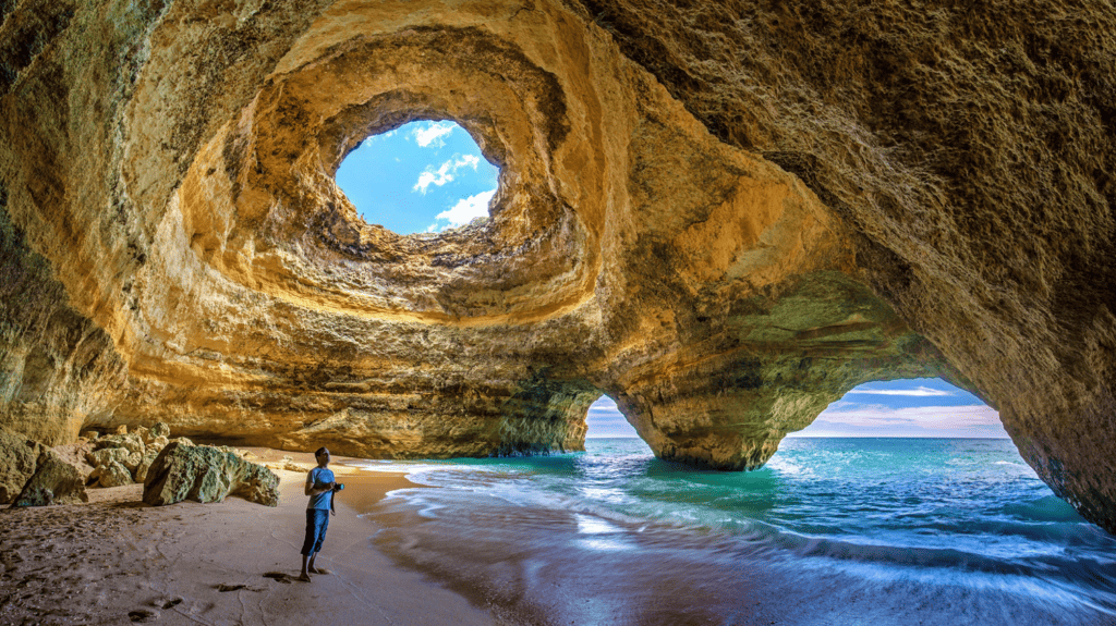 Moving to Portugal: Image of coastal cave in Algarve region of Portugal.