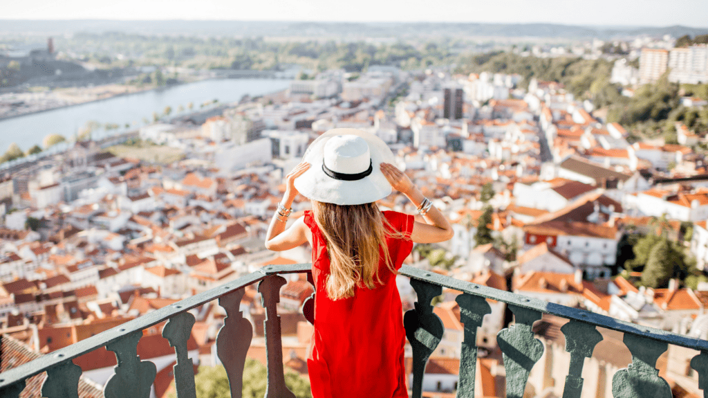 Moving to Portugal: Image of woman looking out over Coimbra Portugal