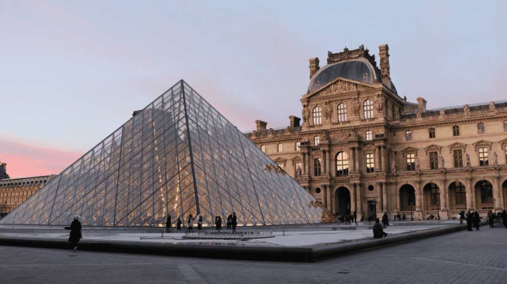 The glass pyramid entrance to the Louvre museum in Paris, France